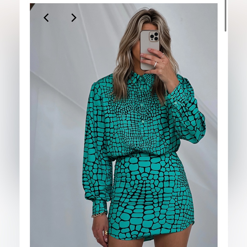 By Egreis teal top